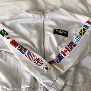 white “WORLDWIDE” windbreaker